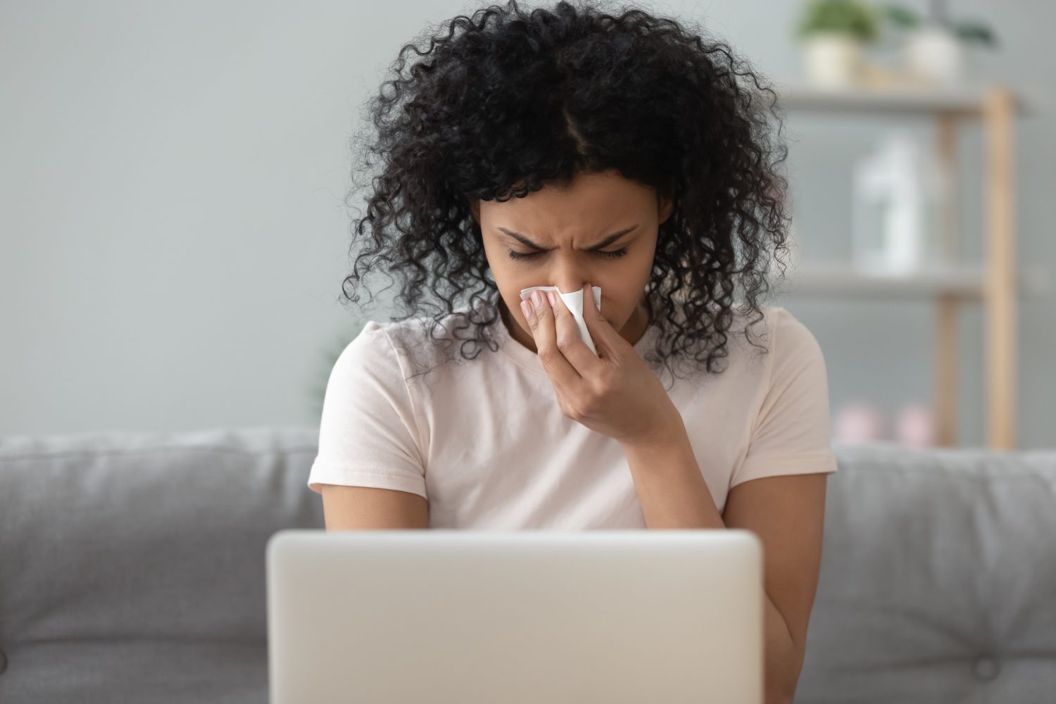 person suffering from spring allergies