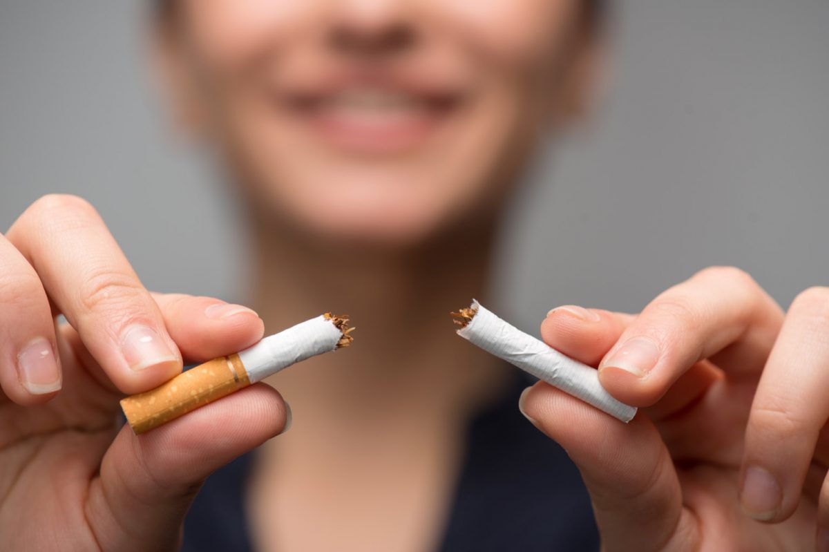snapping a cigarette for overcoming nicotine addiction