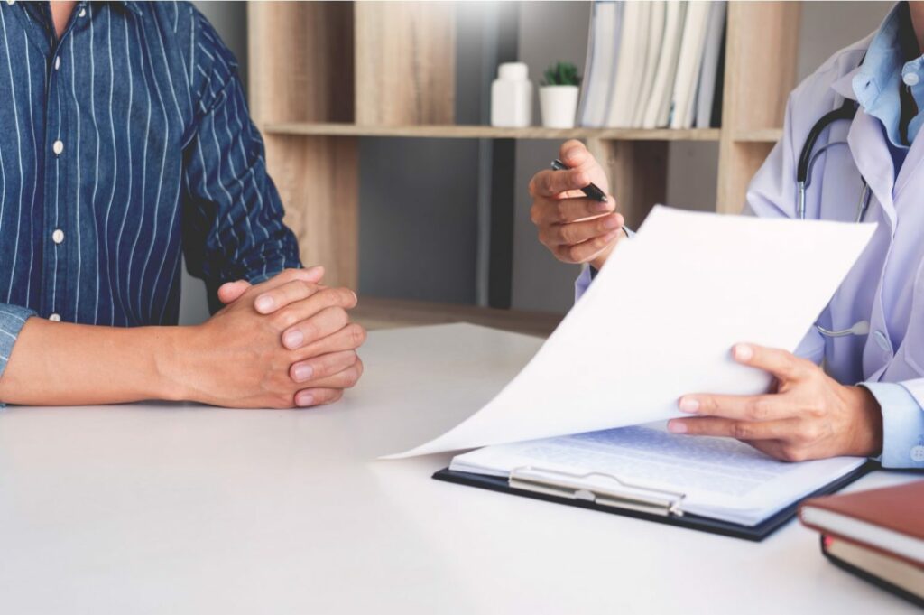 Doctor and Patient reviewing medical history